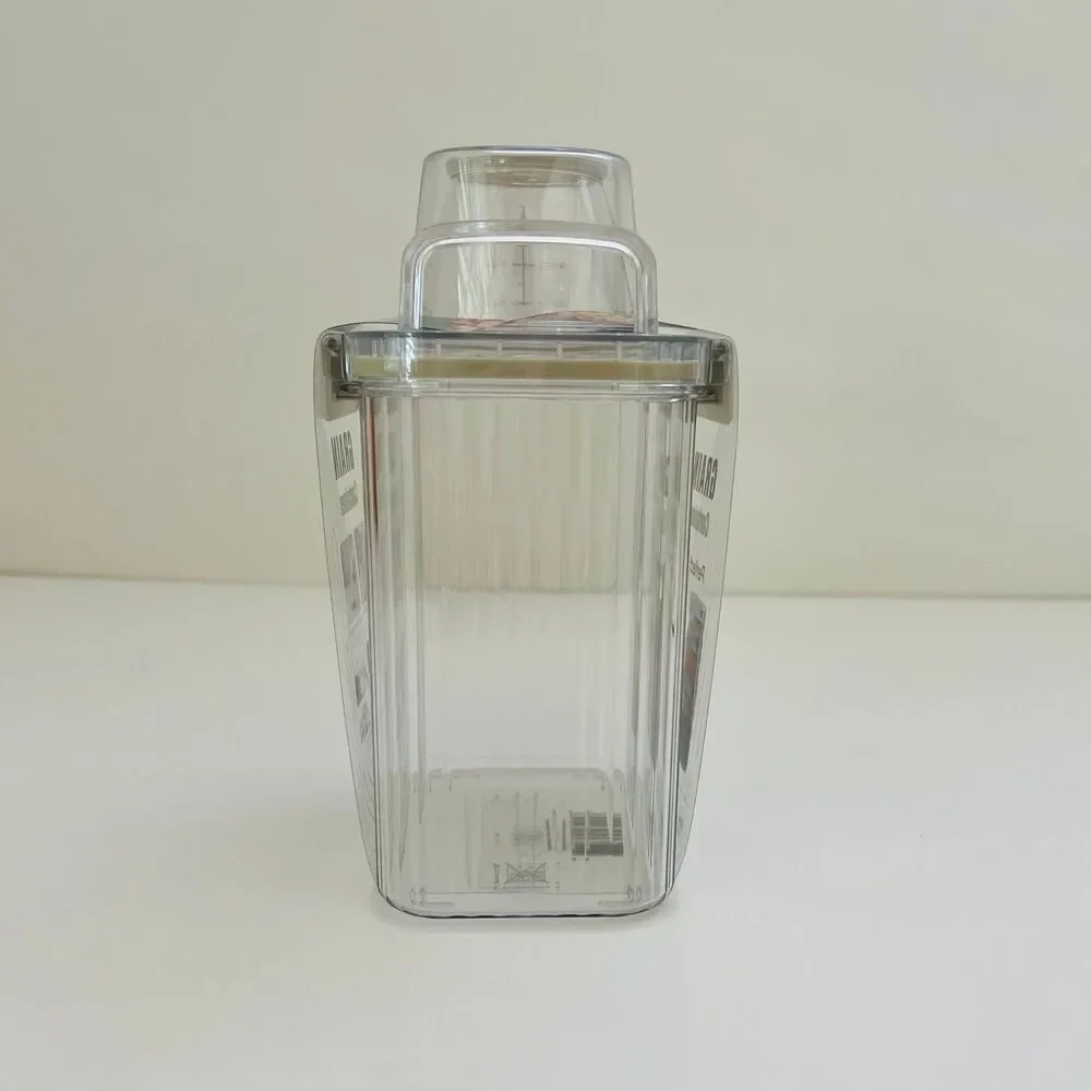 NEOFLAM Clear Plastic Grain Canister Storage Container W Measuring Cup Lid- 1.3L